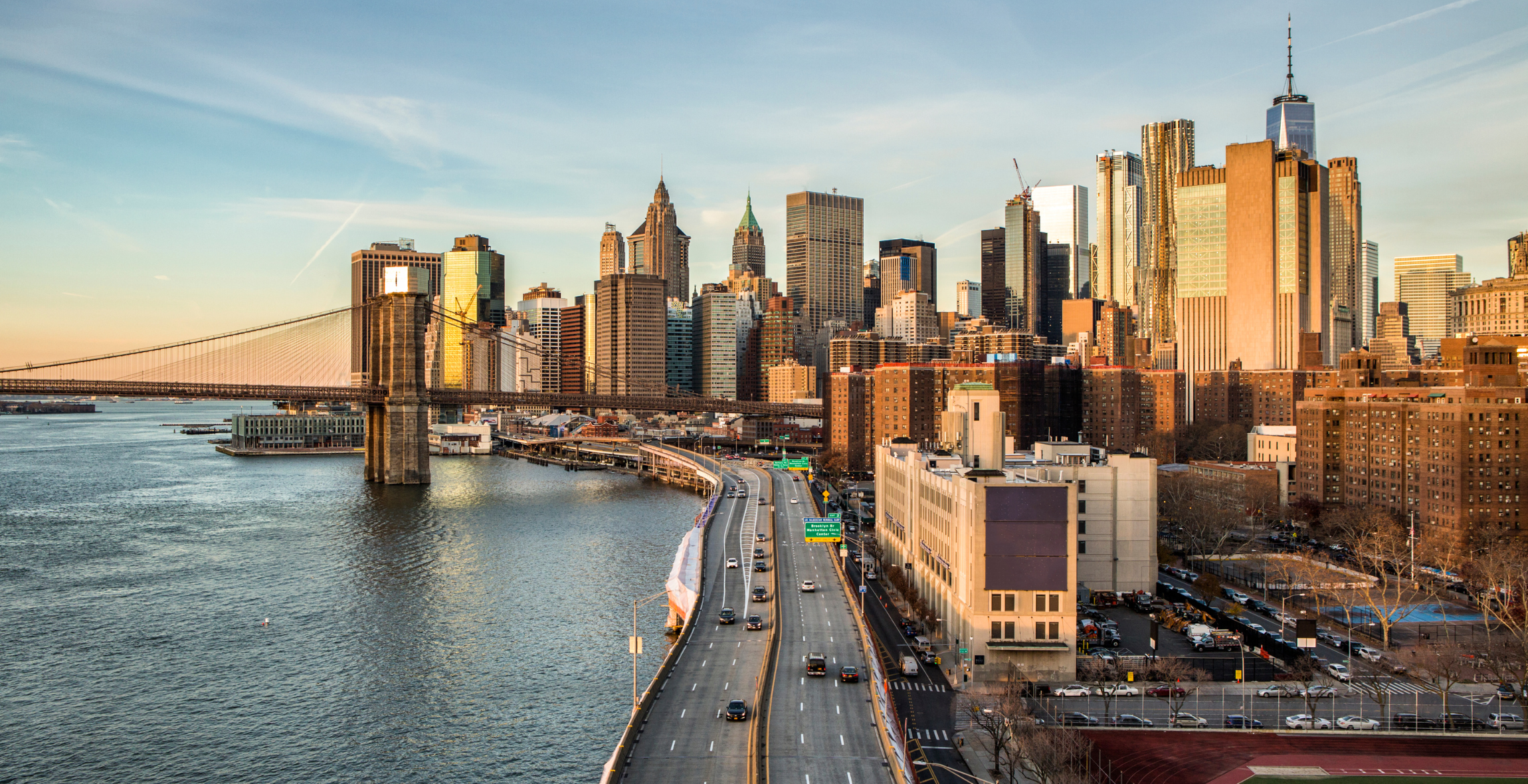 a landscape view of Downton New York City as cars pass by