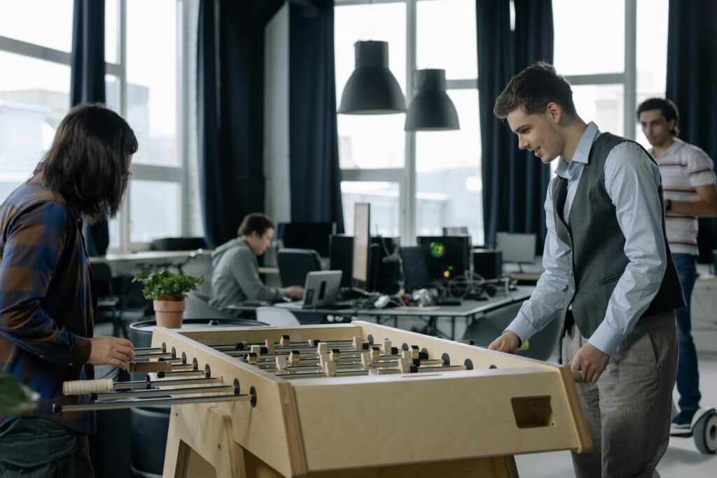 people playing foosball